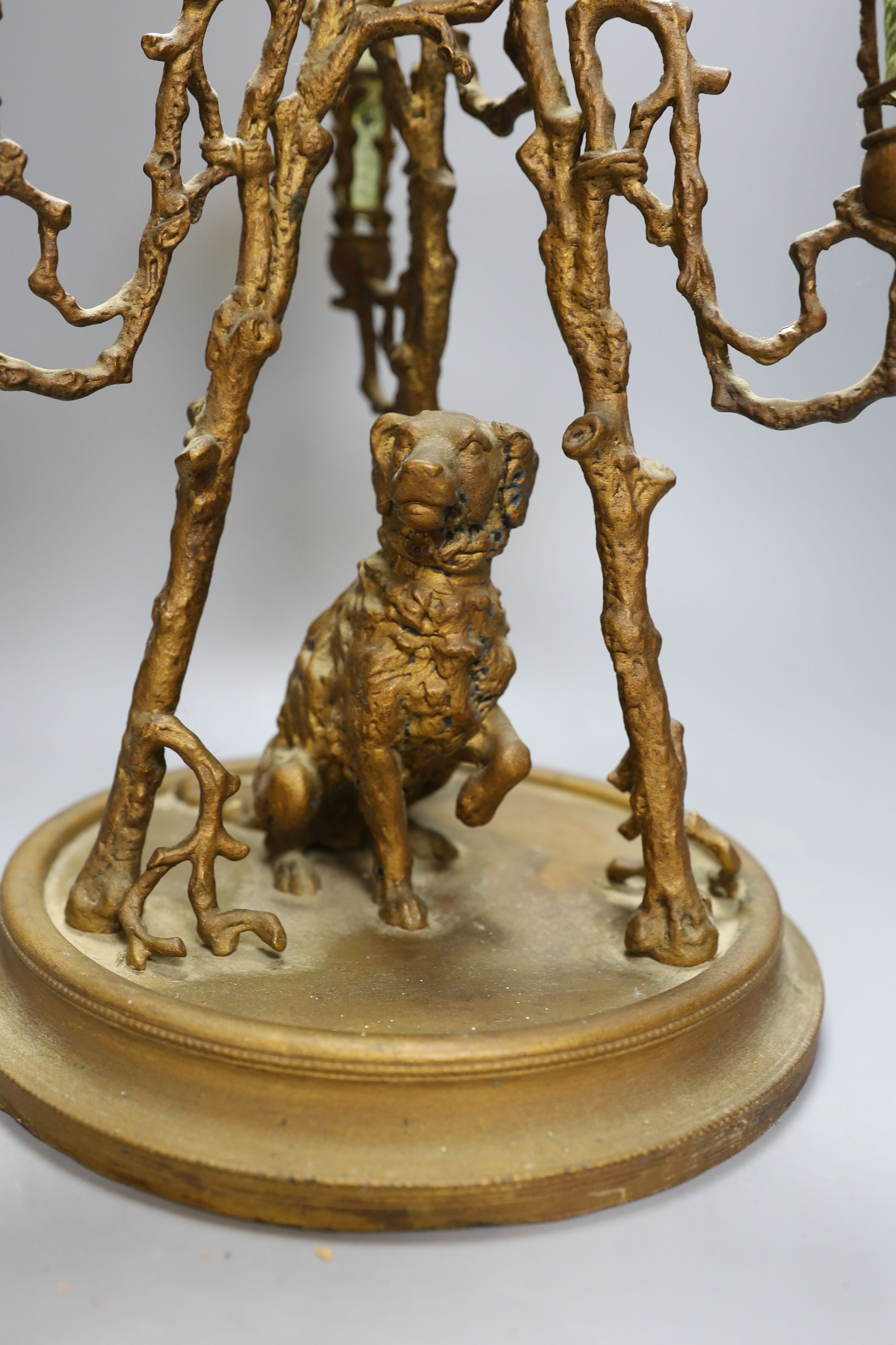 A 19th century 3 branch and spelter epergne decorated with a dog and bird - 41cm tall, with Vaseline glass vases